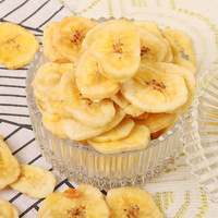 Natuurlijk vacuümgefrituurde bananenchips, knapperige gouden gedroogde fruitsnack, OEM groothandel, gezonde gedroogde voedingsmiddelenleverancier