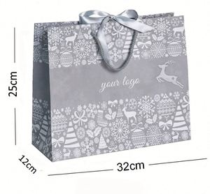 ถุงกระดาษช้อปปิ้งพิมพ์ลายตามสั่ง ทนทาน ใช้ซ้ำได้ สำหรับบรรจุภัณฑ์เสื้อผ้าและเครื่องประดับหรูหรา พร้อมหูหิ้ว เหมาะสำหรับเป็นถุงของขวัญทางธุรกิจ - Product Image 1