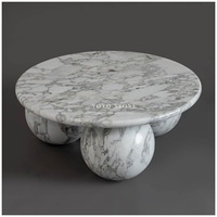 Table basse de luxe en marbre blanc Calacatta avec base sphérique, centre de table moderne et rond pour salon au design artistique