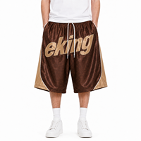 Shorts de basketball capri amples 3/4 style streetwear athlétique avec bordure contrastante et logo graphique imprimé par sublimation personnalisé