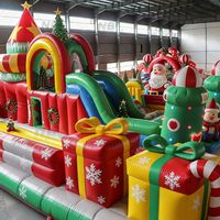 Château gonflable géant de Noël avec toboggan et luge de Père Noël, combo de château gonflable pour l'intérieur et l'extérieur