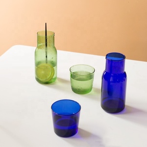 <span class=keywords><strong>Caraffa</strong></span> di <span class=keywords><strong>vetro</strong></span> borosilicato di lusso con Logo personalizzato soffiato a mano chiaro resistente al calore brocca con manico in Marocco per uso alberghiero - Product Image 2