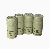Capsules en aluminium et en métal personnalisables avec logo, matériaux, couleurs et styles variés au choix, adaptées aux bouteilles de vin