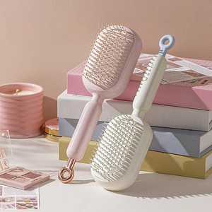 Cepillo de pelo con cojín de aire expandible y retráctil, con diseño de calavera esponjosa, anti-enredos y para masaje del cuero cabelludo, para mujer - Product Image 4