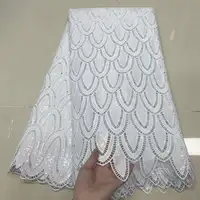सेक्विन के साथ अफ्रीकी कॉर्ड सफेद फीता कपड़े