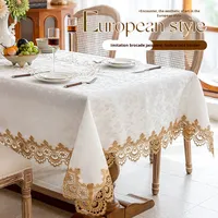 Nappe rectangulaire pour six personnes en fibre chimique soluble dans l'eau, motif floral et bordure en dentelle