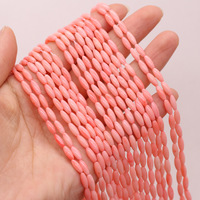 Perles de corail naturel rouge en forme de riz DIY de Guangdong pour la fabrication de bijoux