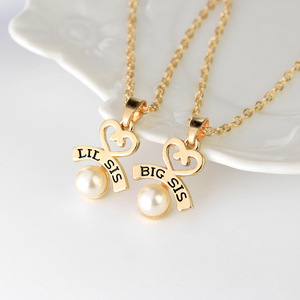 DS Little Big Sister Fashion Collier à pendentif en or et argent avec perle creuse Collier élégant et élégant pour femmes - Product Image 4