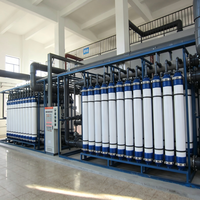 Machinerie de traitement de l'eau, système de membrane UF 100T/H, pompe à moteur contrôlée par PLC, équipement de filtration d'eau par ultrafiltration, 1 an