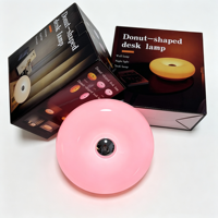 Lampe de table et murale 2-en-1, design sans fil, contrôle tactile de la luminosité, charge USB-C, lampe sculpturale en forme de donut pour la décoration de la maison