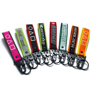 YUEWEN Promotional Gifts <b>Custom</b> Cheap Jet Tag Fabric Embroidery Car Keychains Woven Keychain - Product Image 3