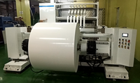 Machine à remonder, cliveuse, automatique, pour rouleaux de papier