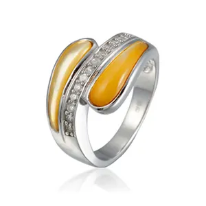 Кольцо из серебра и золота ручной работы с желтым топазом