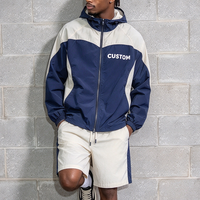 Ensemble de survêtement léger en nylon et polyester pour homme, coupe-vent à capuche 2 pièces avec blocs de couleur personnalisés et short de jogging