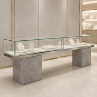 Comptoir de présentation de bijoux sur mesure, vitrine en verre sans cadre, double piédestal, base à motif pierre pour les magasins de détail de bijoux
