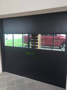 ประตูโรงรถอลูมิเนียมหรูหราบานกระจกแบบแยกส่วนที่ปลอดภัยทางเข้าเรียบไร้เสียงสำหรับคลับเฮาส์และรีสอร์ท - Product Image 6