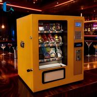 Petit distributeur de collations et de boissons personnalisable avec options de paiement en espèces