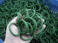 Fabricant de moules en silicone pour joints toriques, spécialisé dans le moulage de caoutchouc silicone liquide, offrant des services de découpe et de traitement du caoutchouc, vert