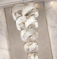 Lustre long en cristal de luxe pour escalier de duplex français, loft, hôtel, club, salle de banquet