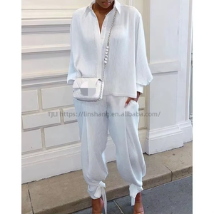 Women's Sexy Knitted Hand-crocheted Fringed Asymmetric Top and <b>Pants</b> Fashion Casual 2-piece Set Fashion - Product Image 2
