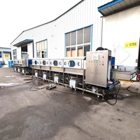 Machine à laver les caisses avec sécheuse intégrée et système de retournement automatique des paniers pour la production de pain et de produits alimentaires en boulangerie