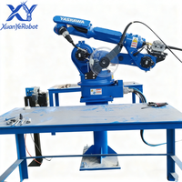 Robot de soudage YASKAWA à 6 axes, moteur PLC, bras robotique CNC, poste de travail collaboratif automatique avec table, charge utile de 12 kg, haute efficacité, Chine