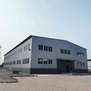 อาคารเหล็กโครงสร้างมาตรวัดหนักแบบสำเร็จรูปการออกแบบก่อสร้าง - Product Image 1