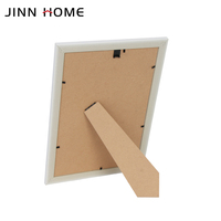 Cadre photo sculpté blanc et or vintage Jinn Home, élégant cadre photo antique pour affichage mural ou sur table