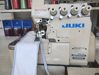Machine à coudre surjeteuse industrielle à grande vitesse à 4 fils JUK1 MO-6714S d'occasion