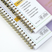 Carnet de planification 2026 personnalisé avec couverture en PP spirale dorée, organiseur en carton, vue hebdomadaire