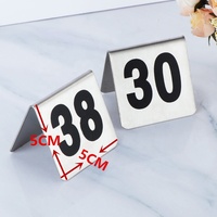 Papan Nama Rumah dari Baja Anti Karat Perak Custom Pabrik 5*5CM, Bentuk Oval, Tahan Lama, dengan Nomor Digital untuk Meja Restoran