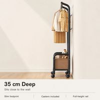 Porte-vêtements sur roulettes autoportant à tube rond épais grande capacité avec rail de suspension pour chambre familiale et placard