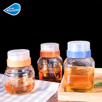 Botol kaca madu 250ml 350ml, kelas atas desain baru kaca madu makanan dapur stoples bumbu plastik anti bocor Tuang
