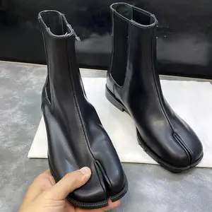 XINZI yağmur düşük adedi özel Chelsea yarım çizmeler moda bölünmüş ayak gerçek deri 2.5cm kauçuk taban kadınlar için Tabi çizmeler kış