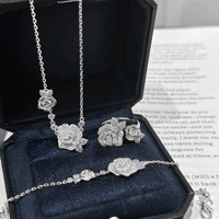 Parure de bijoux LUOYUNE plaqué or 18 carats en laiton, motif fleur de rose, avec collier, bracelet et bague en oxyde de zirconium, pour mariage, vente en gros, OEM