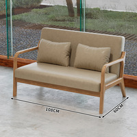 Fauteuil en bois massif nordique avec coussin, mobilier de salon moderne pour café, restaurant, hôtel, réception
