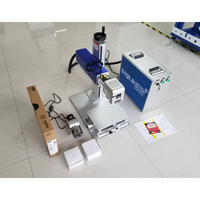 Mesin penanda laser STJ-50F mesin ukir laser mesin ukiran laser Harga logam mesin pengukir laser untuk perhiasan uv /co2 /fly