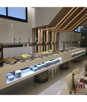 Comptoir de bar moderne en pierre artificielle d'onyx rétro-éclairé brillant