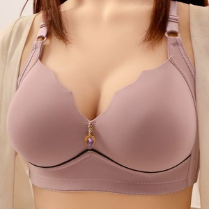 Sujetador de moda para mujer de talla grande, venta al por mayor de fábrica, fino, con efecto push-up, sin costuras, con botón trasero ajustable. - Product Image 4