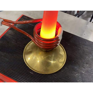 Équipement de chauffage par induction automatisé pour applications de traitement en usine, offrant un contrôle précis et un chauffage uniforme - Product Image 1