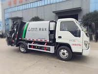 Les camions à ordures compacteurs Futian à chargement et déchargement arrière sont équipés d'un système de commande à un bouton.