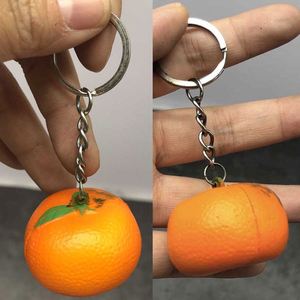 Article promotionnel : Mini balles anti-stress extensibles en mousse PU, motif orange mandarine, avec porte-clés - Product Image 3