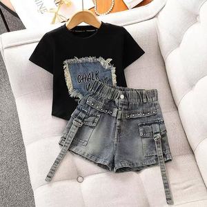 Conjunto <span class=keywords><strong>de</strong></span> <span class=keywords><strong>Ropa</strong></span> <span class=keywords><strong>de</strong></span> Punto <span class=keywords><strong>de</strong></span> Moda <span class=keywords><strong>de</strong></span> 2 Piezas para Niños, Verano 2026, Camiseta Negra <span class=keywords><strong>de</strong></span> Manga Corta con Parches Lindos + Pantalones <span class=keywords><strong>de</strong></span> Moda - Product Image 1