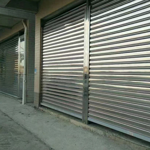Porte de <span class=keywords><strong>garage</strong></span> en acier inoxydable fini, moderne, automatique, à enroulement, haute sécurité, résistante au vent, pour entrepôt industriel - Product Image 1
