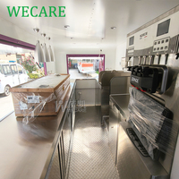 Remorque de bar mobile WECARE entièrement équipée pour la vente de glaces, café, hot-dogs, pizzas et autres snacks, avec cuisine complète.