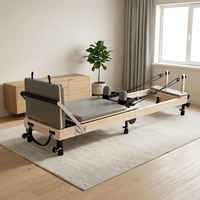 Appareil de Pilates Reformer pliable, modèle MJD W38A, avec structure en bois d'érable massif et pieds de support en acier, durable et sain.