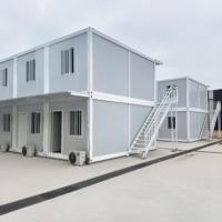 Maison préfabriquée modulaire à deux étages en conteneur, isolation par panneaux sandwich, conception ignifuge pour atelier de construction, kiosque extérieur
