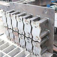 QT4-15 Ligne de production de blocs creux et solides en béton entièrement automatique à haute pression pour la construction au Sénégal