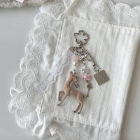 Porte-clés et breloque de téléphone en forme de cerf floqué, fait main, style coréen, orné de petites fleurs et de perles, pour sac, produit de niche unique, vente en gros