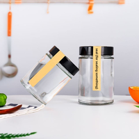 Emballage de pot de bouteille rond grands pots ronds clairs en verre avec couvercles noirs pour le stockage pot de miel alimentaire pour emballage alimentaire en conserve